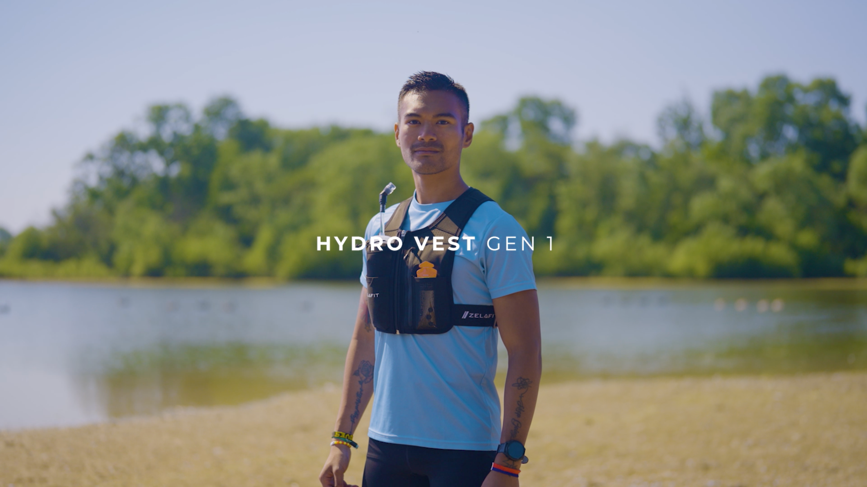 Male stood by the lake shore wearing ZelaFit Hydro Vest Gen 1